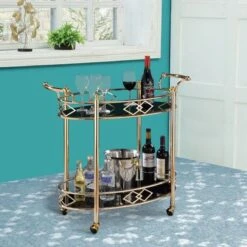 Two Tier Metal Framed Serving Cart With Designer Side Rails And Glass Shelves, Gold And Black - Metal -Elegance Barware 1e00eb25 e62f 4221 9ac3 7169cfae1dbc