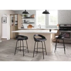 Carson Carrington Stavanger Fixed-Height Swivel Counter Stool With Black Metal Base & Round Footrest (Set Of 2) - Black Faux Leather/Black Wood -Elegance Barware a49929d2 be09 4932 8aca 4bb9b7a8674e